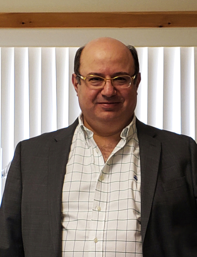 Dr. Aziz Massaad